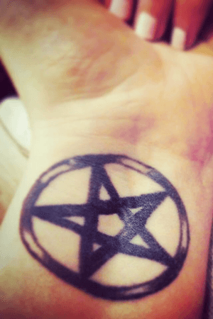 I had thjs along with another wrist piece tattooed by TattooStu (StuartRowles) because I have always been interested in Wicca/Paganism and had just started my way down my own path of discovery.