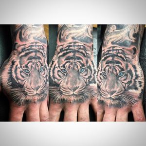 Tattoo uploaded by Brandon Shuman • Tiger hand • Tattoodo Tattoo uploaded by Brandon Shuman • Tiger hand • Tattoodo