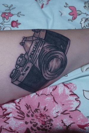 This was my next tattoo which was done in two parts by one of my favourite artists named Stu Rowles though fondly known as TattooStu. It was a piece to represent my venture into photography as at the time I had just finished my photography course at college and this was (and still is) my favourite camera - a Pentax K1000