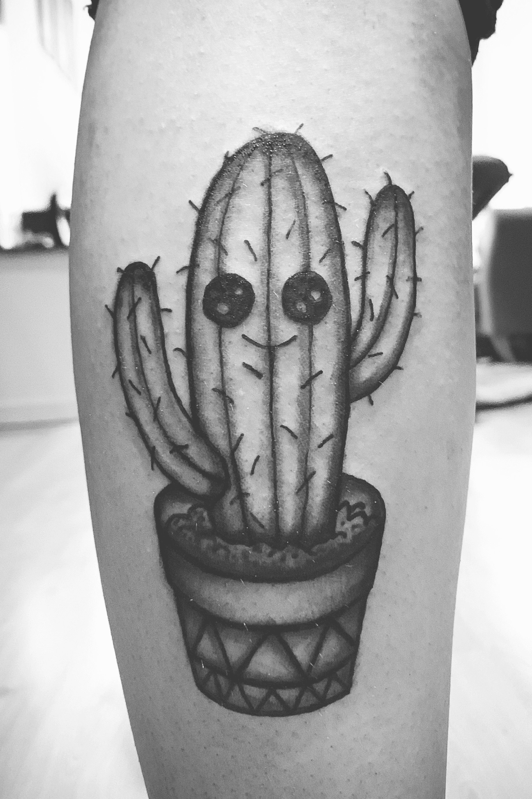 Premium Vector  Tattoo design hand drawn skull with cactus line art black  and white
