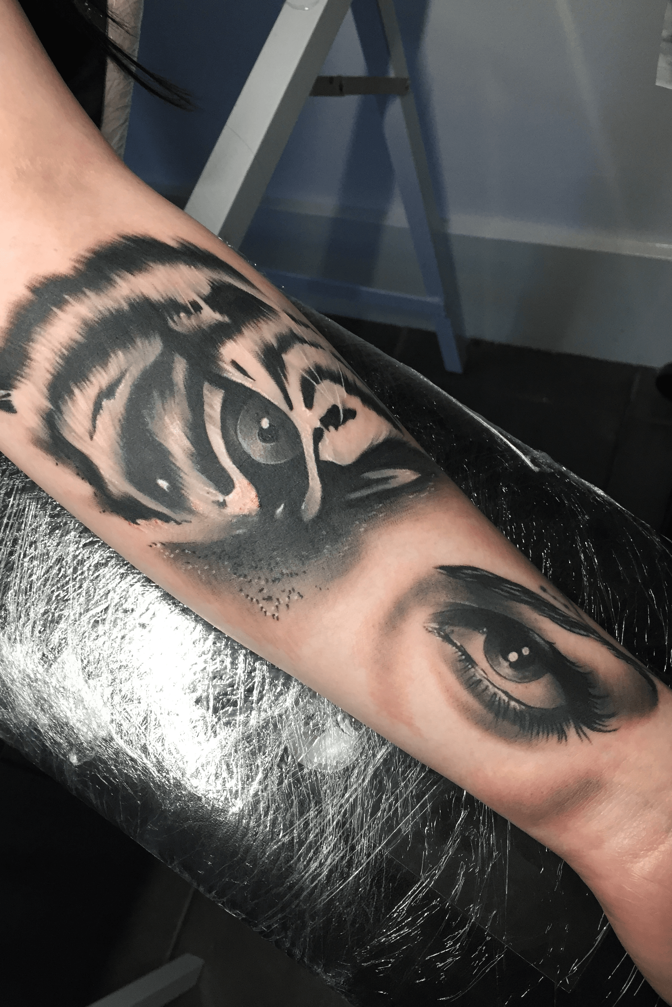Realistic Flowers And Tiger Head Tattoo On Girl Right Half Sleeve