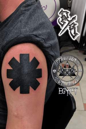 Red hot chili peppers logo tattoo 