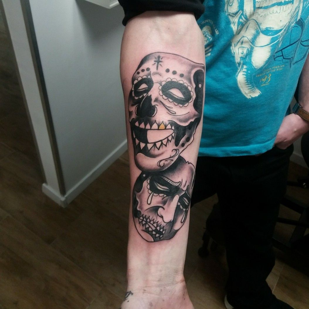 skeleton man tattoo smiling