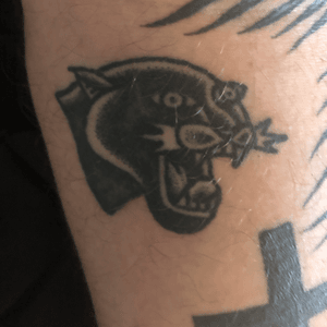 Handpoked panther by Tarzan at Trademark Tattoo