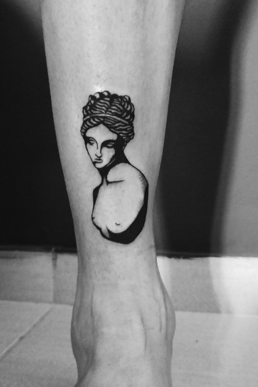 Minimalistic tattoo version of The Birth of Venus