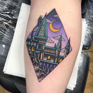 Tattoo by Alice SB #AliceSb #color #traditional #newschool #neotraditional #mashup #bold #bright #harrypotter #hogwarts #castle #school #architecture #building #moon #stars #nightsky