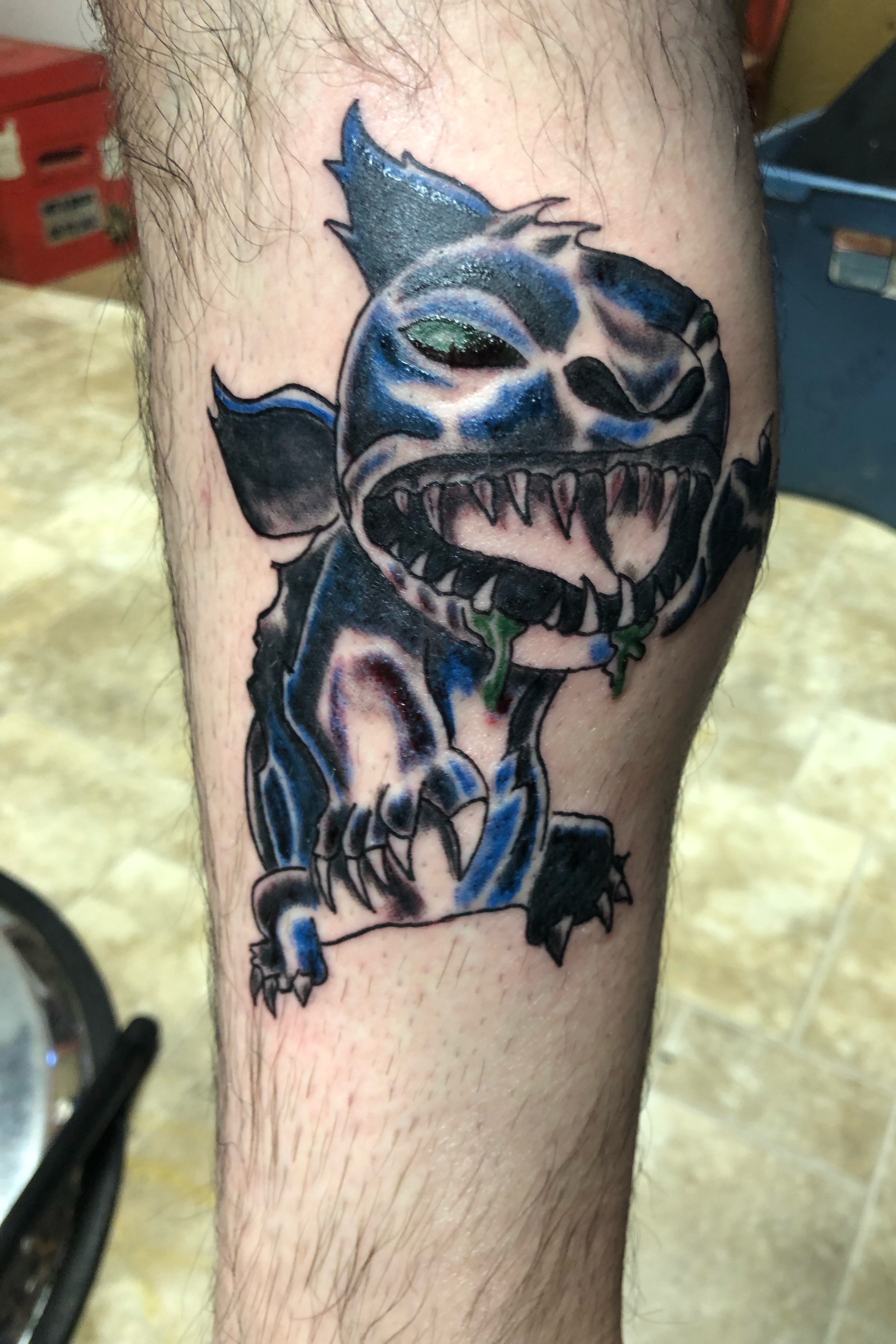Evil stitch tattoo