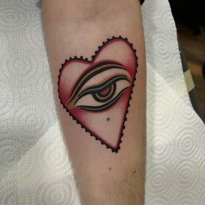 Tattoo by Cloditta #Cloditta #heart #buddha #buddhaeye #eye #love #traditional #oldschool #color #tipping #tipyourartist #tippingmakesithurtless #tippingisappreciated