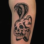 Tattoo by Alex Zampirri #AlexZampirri #Azamp #snaketattoo #snake #reptile #animal #nature #blackwork #skull #death #cobra #traditional