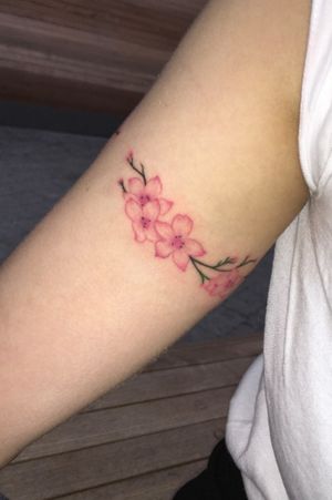 Cherry blossom branch wrapping around my upper arm 😍