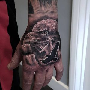 Eagle hand tattoo black and grey #blackandgreytattoo #blackandgrey #realistic  #realism #realistictattoo #blackandgraytattoo  #blackandgraytattoos #blackandgraytattoos #tattoo #handtattoo #eagletattoo 