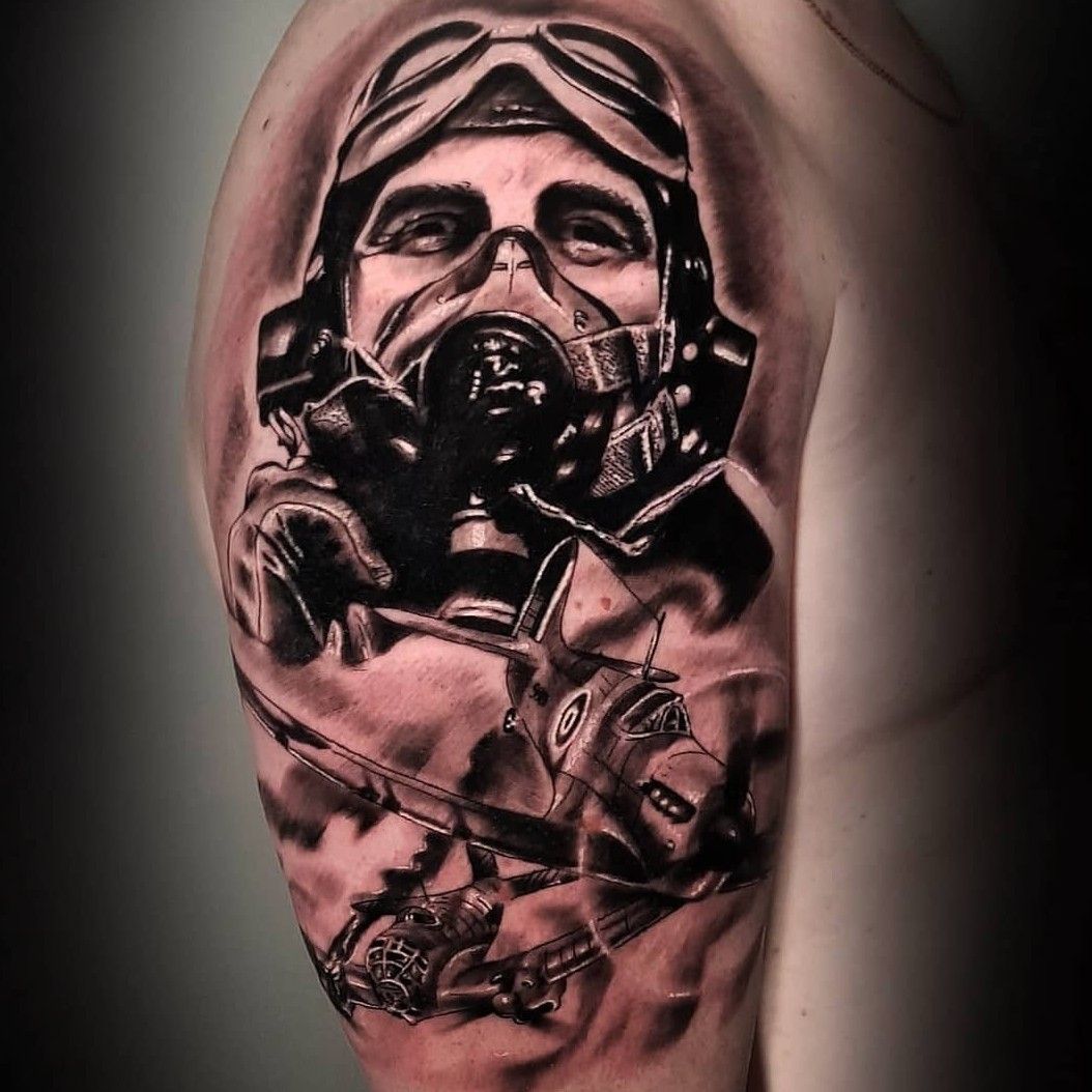 Tattoo uploaded by Jack Carroll • Ww2 fighter pilot realistic black and grey tattoo #blackandgreytattoo #blackandgrey #realistic #realism #realistictattoo #blackandgraytattoos #tattoo #ww2tattoo • Tattoodo