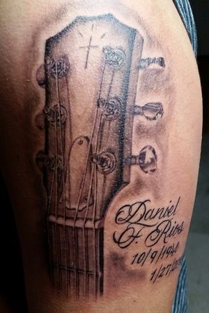 Memorial guitar tattoo