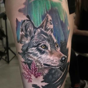 Tattoo by Victoria Benea #VictoriaBenea #besttattoos #tattoodoapp #appspotlight #spotlight #best #awesome #cool #wolf #animal #mapleleaf #realism #realistic #auroraborealis #dog #nature