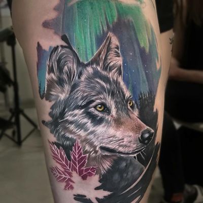 Tattoo by Victoria Benea #VictoriaBenea #besttattoos #tattoodoapp #appspotlight #spotlight #best #awesome #cool #wolf #animal #mapleleaf #realism #realistic #auroraborealis #dog #nature