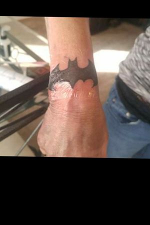 batman logo tattoo wrist