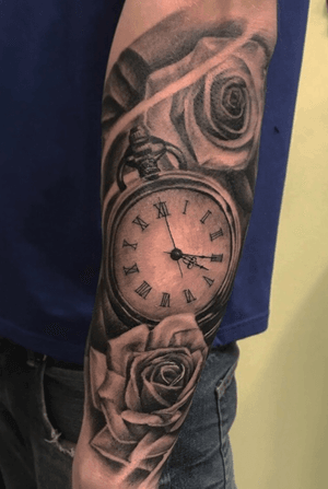 Pocket watch and roses by Jake Macqueen