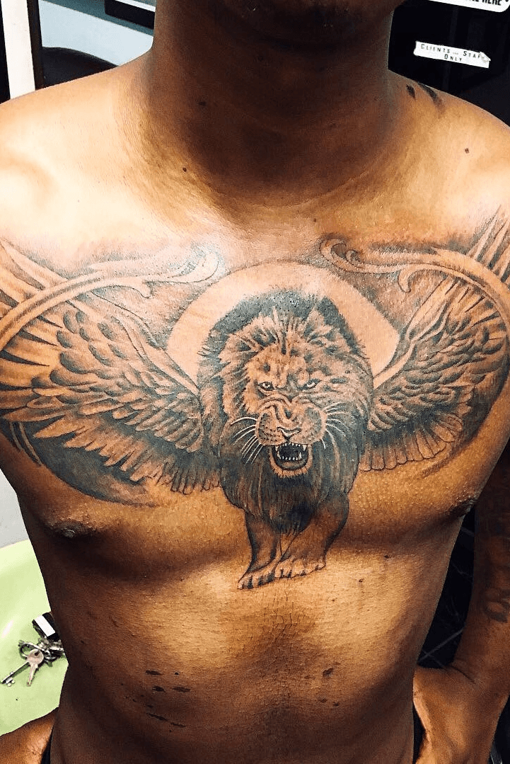 Tattoo uploaded by Justin JP Param  Chest piece lion skulls and wings   Tattoodo