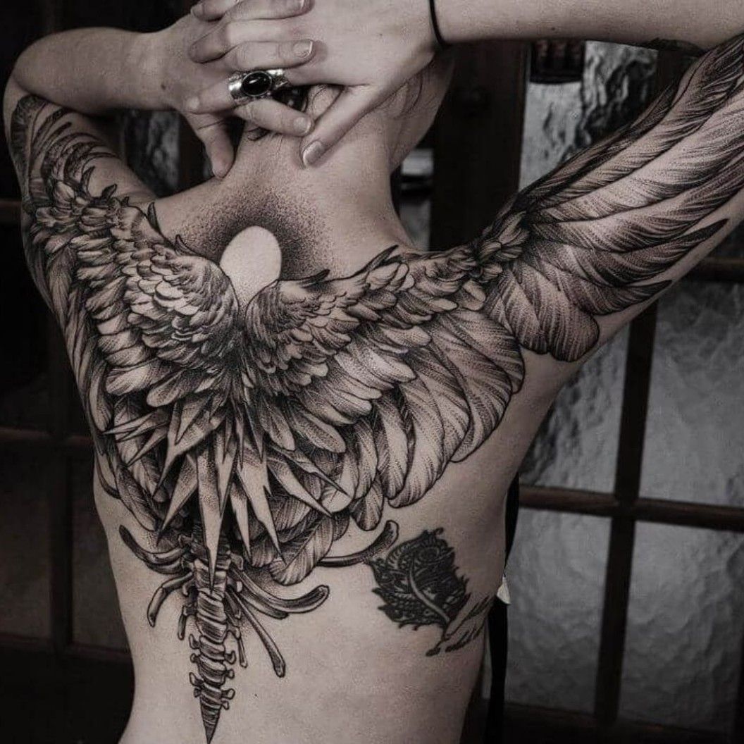 Fine line angel and devil wings tattoo on the shoulder