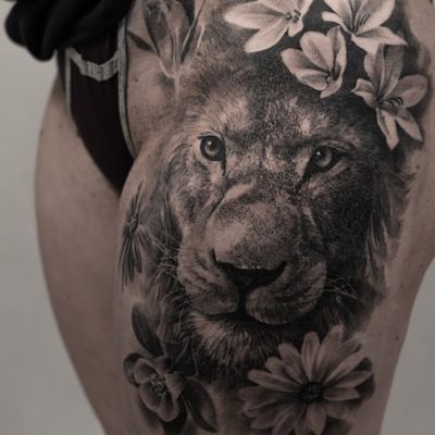 LION tattoo with flowers on girl