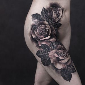 rose  tattoo with leaves  on girl
