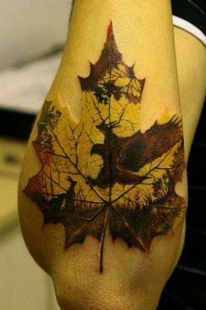 Realistic maple leaf with bird and rabbit