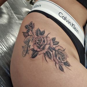 Get a stunning blackwork flower tattoo on your upper leg by the talented artist Dani Mawby. A unique and beautiful piece of art.