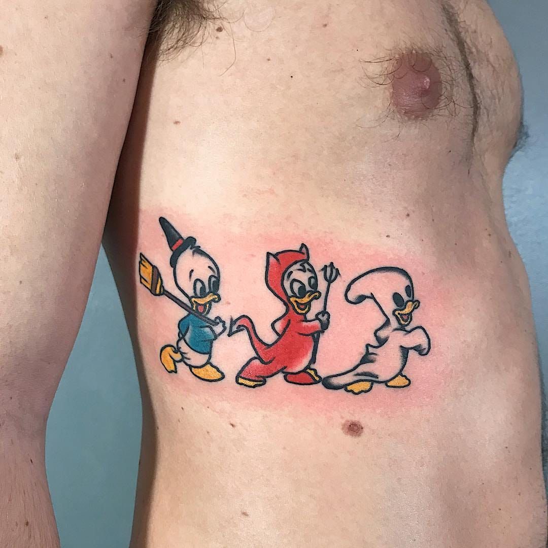 Devil Tail Tattoo On Back