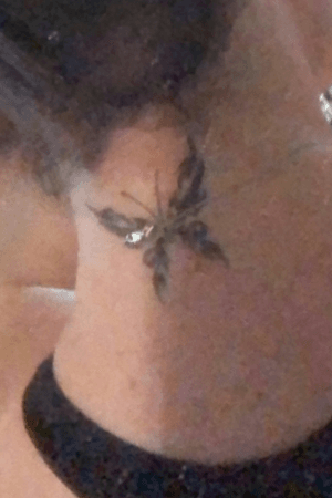 Beautiful butterfly on the back of my neck 