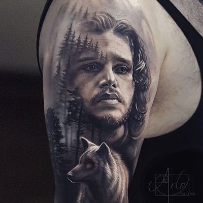 Game of Thrones tattoo by Arlo Tattoos #ArloTattoos #GameofThrones #GameofThronestattoo #GoT #GoTtattoo #HBO #tvshowtattoo #popculturetattoo #jonsnow #direwolf #wolf #realism