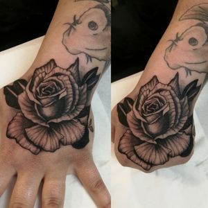 Rose black work. Hand tattoo.