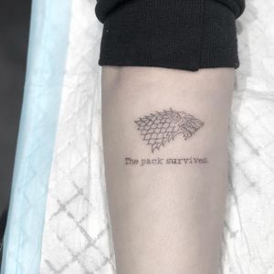 Game of Thrones tattoo by Lauren Winzer #LaurenWinzer #GameofThrones #GameofThronestattoo #GoT #GoTtattoo #HBO #tvshowtattoo #popculturetattoo #direwolf #typewriter #minimal #illustrative #fineline