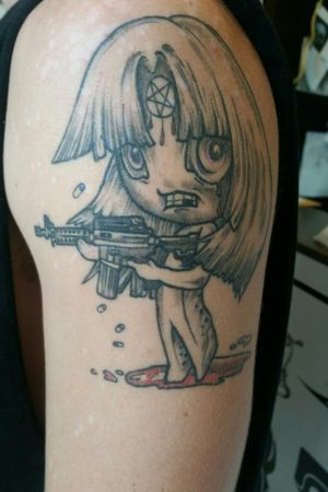 A little angry girl with a machine gun...