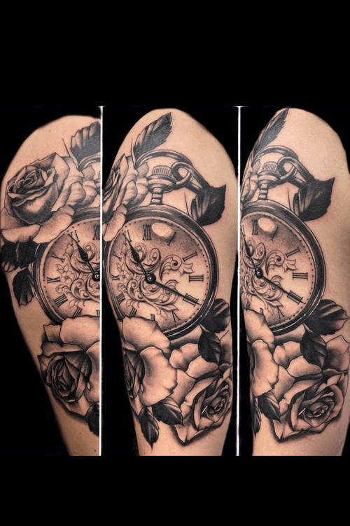 Classic time piece and roses.