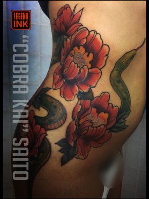 Peonies and snake by Cobra Kai at Legend Ink Email for appointments CobraKai@Legendink.com
