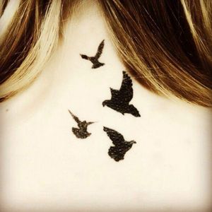 Four doves in black ink.