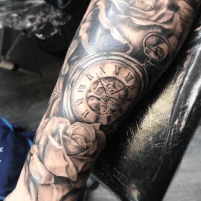 Soft black and grey, classic pocketwatch and roses on a wrist. #pocketwatch #blackandgrey #sleeve #roses #liverpool #badsandy