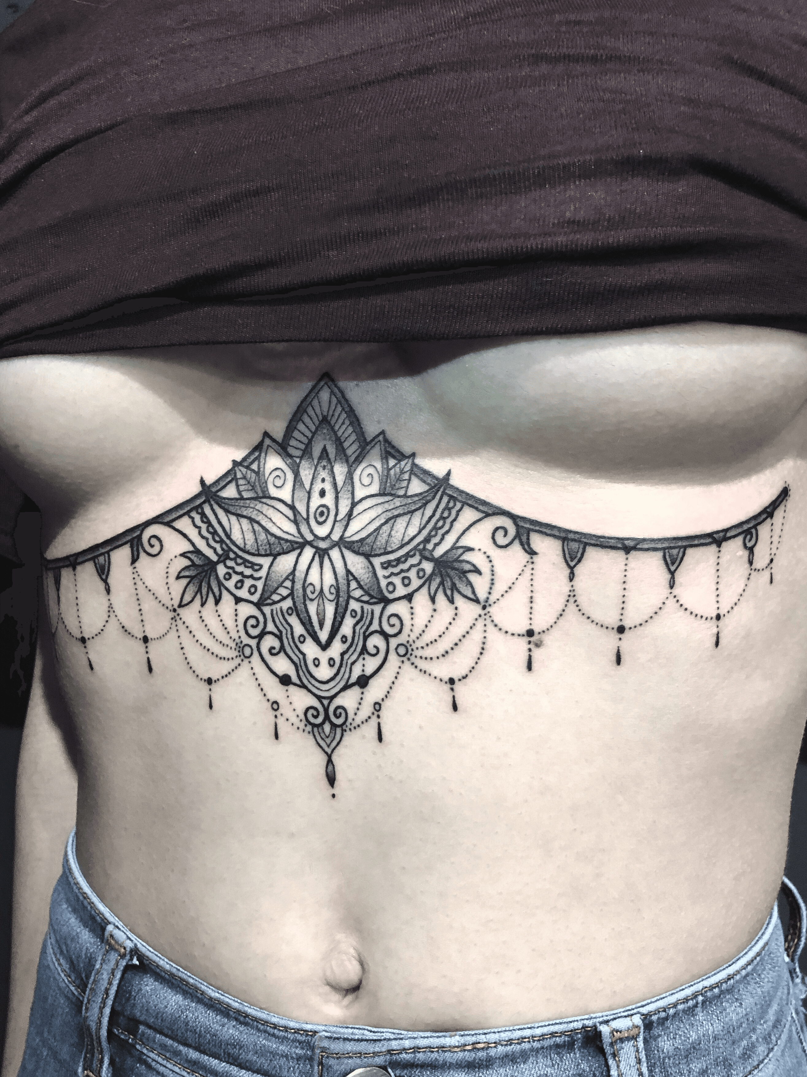 Mandala under breast tattoo designs
