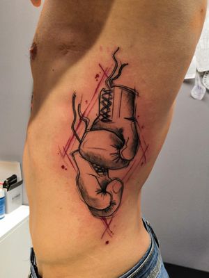 Boxing gloves tattoo 😎Artist: Cecilia Turchetto#boxer #boxertattoo #boxing #boxinggloves #boxingtattoo #fight #fighter #drawing #ribs 