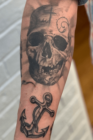 Healed skull with a little anchor add on. #skull #skulltattoo #bnginksociety #realism #realistic 