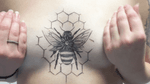 Bee and honeycomb tattoo done a Bad Seed Tattoo Co