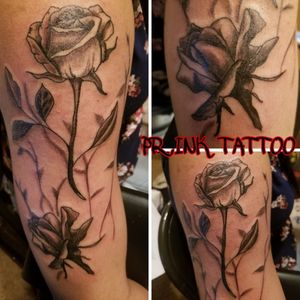 Black and grey tattoo of roses