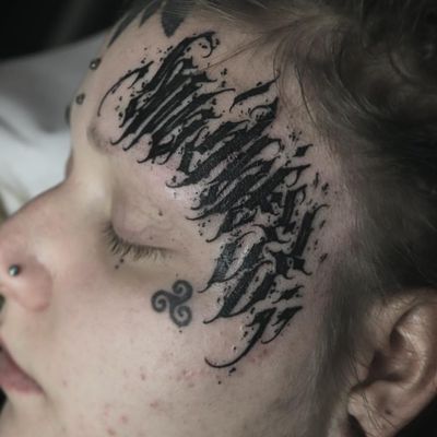 Face tattoo by Bastian Blau #BastianBlau #letteringtattoos #lettering #text #font #type #calligraphy #script #letters #quotes #words