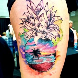 This #sunset #beachscene in a #pinapple was such a unique take on a tattoo! I really enjoyed the design challenges! #pinappletattoo #beachscenetattoo #watercolortattoo #hawaiitribute #conventionlife