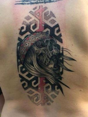 Tattoo with mapuche iconography by Alejandro Muñoz Leal.