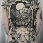 Back tattoo by Kyle Stacher aka Thief Hands #KyleStacher #ThiefHands #backtattoo #backpiece #illustrative #linework #nature #organic #fineline #dotwork #flowers #floral #leaves #mountains #landscape #skull #moon #stars