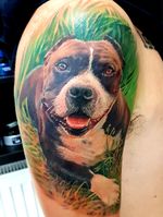 Bully lover. A tattoo of his dog.