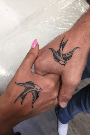 Couples matching swallows.