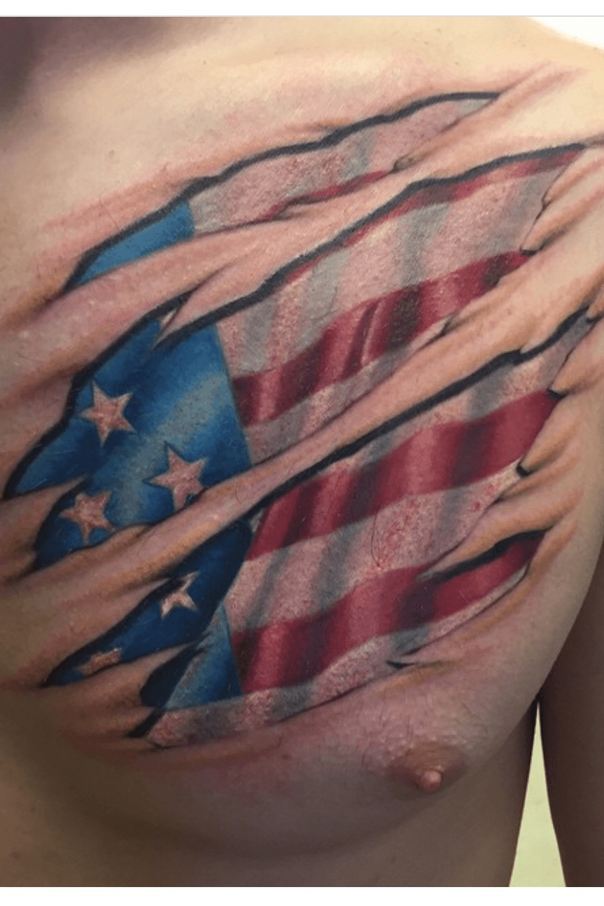 Ripped Skin USA Flag Tattoo On Bicep For Men