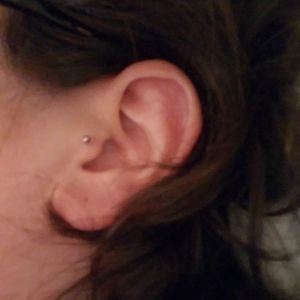 Tragus piercing - left ear